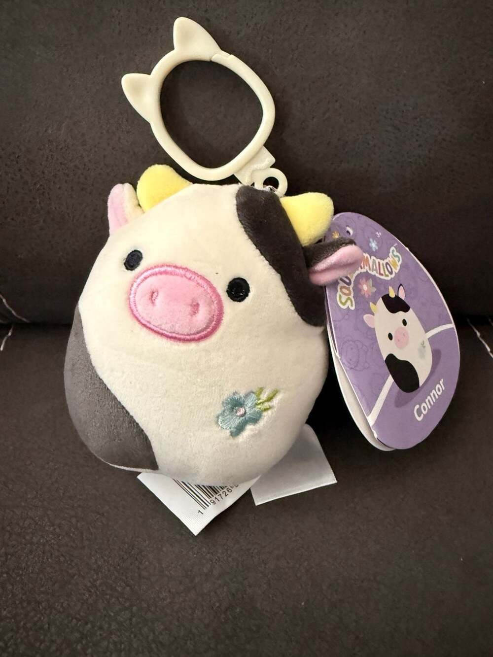 Squishmallows 3.5-inch Connor the Cow with Flower Plush Clip-On Keychain